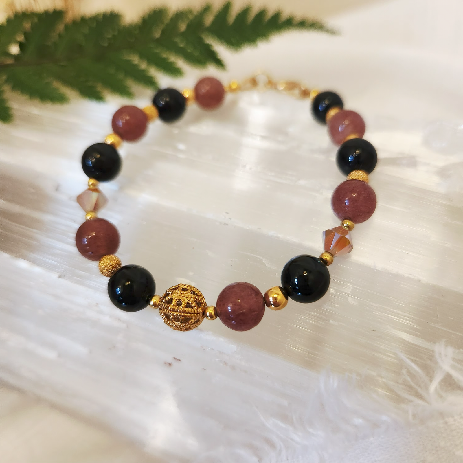 Alternative view of Strawberry Quartz and Black Tourmaline bracelet with Filigree and Swarovski beads