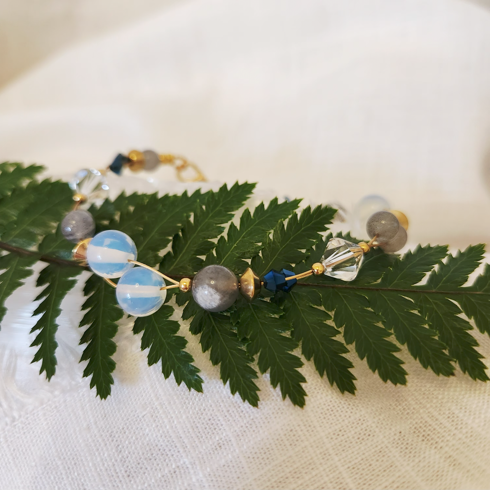 Alternative view of Labradorite and Opalite double string bracelet with Swarovski beads